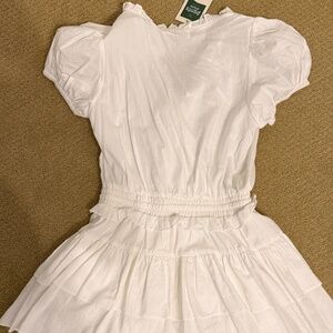 Brand new, never worn, white puff sleeve romper